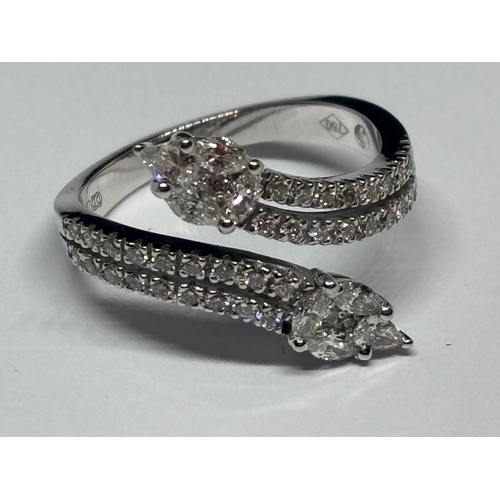 583 - AN 18 CARAT WHITE GOLD RING WITH TWO MARQUISE CUT NATURAL DIAMONDS AND THIRTY SIX ROUND BRILLIANT CU... 