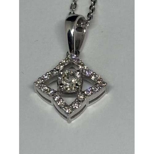 584 - AN 18 CARAT WHITE GOLD PENDANT WITH CHAIN, STUDDED WITH 0.44 CARATS OF ROUND BRILLIANT CUT NATURAL D... 