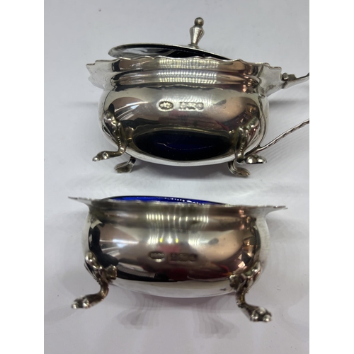 92 - A PAIR OF HALLMARKED BIRMINGHAM SILVER CRUETS WITH BLUE GLASS LINERS GROSS WEIGHT 91.2 GRAMS (WITHOU... 