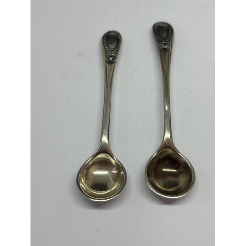 94 - FOUR HALLMARKED SILVER MUSTARD SPOONS TWO LONDON TWO BIRMINGHAM GROSS WEIGHT 24 GRAMS