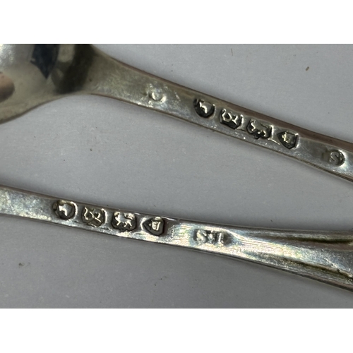 94 - FOUR HALLMARKED SILVER MUSTARD SPOONS TWO LONDON TWO BIRMINGHAM GROSS WEIGHT 24 GRAMS