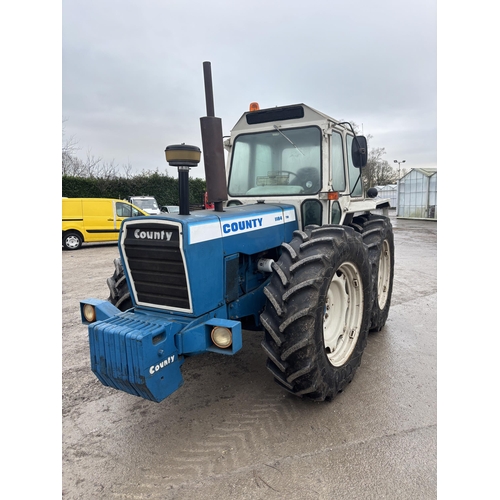 201 - A 1981 COUNTY TW1184 TRACTOR, REGISTRATION NDV 411W, COMPLETE WITH A SET OF 10 COUNTY FRONT WEIGHTS,... 