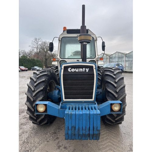 201 - A 1981 COUNTY TW1184 TRACTOR, REGISTRATION NDV 411W, COMPLETE WITH A SET OF 10 COUNTY FRONT WEIGHTS,... 