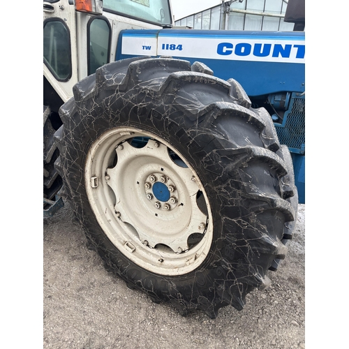 201 - A 1981 COUNTY TW1184 TRACTOR, REGISTRATION NDV 411W, COMPLETE WITH A SET OF 10 COUNTY FRONT WEIGHTS,... 