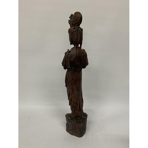 303 - A CARVED CHINESE GUANYIN KWAN-YIN WOOD SCULPTURE - 62.5 CM