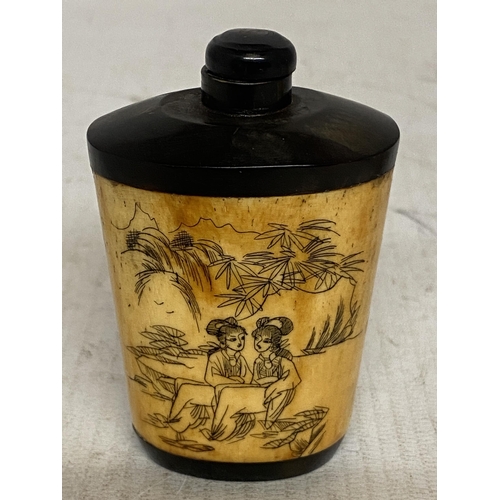 305 - A CHINESE LACQUERED WOOD AND BONE SNUFF BOTTLE WITH FIGURAL SCENES