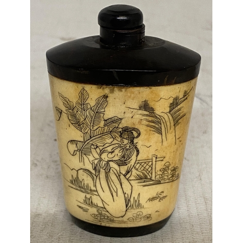 305 - A CHINESE LACQUERED WOOD AND BONE SNUFF BOTTLE WITH FIGURAL SCENES