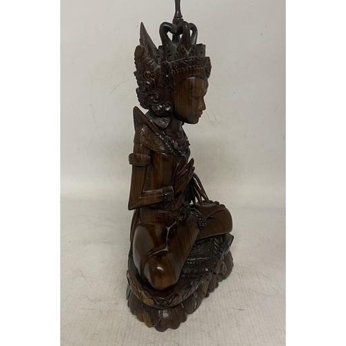 315 - A WOOD CARVED SCULPTURE OF HINDU GOD INDRA ON LOTUS BASE - 29 CM