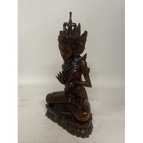 315 - A WOOD CARVED SCULPTURE OF HINDU GOD INDRA ON LOTUS BASE - 29 CM