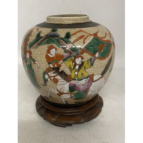 317 - A CHINESE PORCELAIN CRACKLE GLAZE NANKING JAR/TEA CADDY PAINTED WITH WARRIOR FIGURES AND HORSES - IN... 