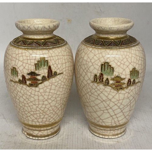 321 - A PAIR OF JAPANESE CREAM COLOURED EARTHENWARE WITH A CRACKLE GLAZE SATSUMA VASES WITH SCHOLAR LANDSC... 