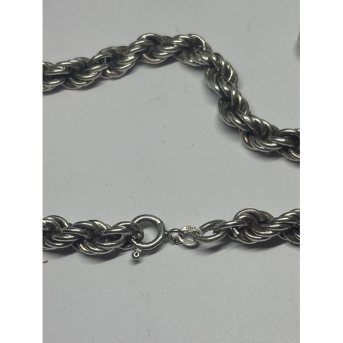 596 - A HEAVY SILVER ROPE NECKLACE LENGTH 18