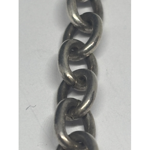 597 - A SILVER HALF ALBERT CHAIN WITH T BAR AND CLIP (CLIP NOT SILVER)