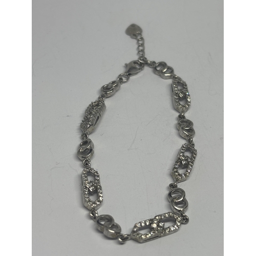 598 - THREE ORNATE SILVER BRACELETS