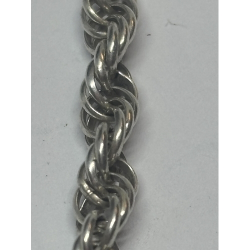 603 - A MARKED SILVER ROPE NECKLACE LENGTH 20