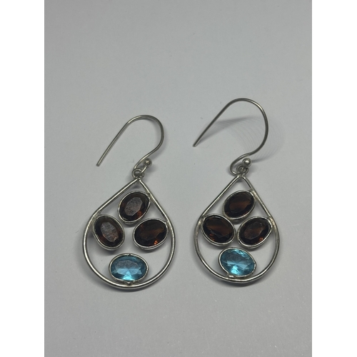 608 - A PAIR OF MARKED 925 SILVER AND BROWN/BLUE STONE EARRINGS IN A PRESENTATION BOX