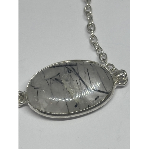 616 - A MARKED SILVER NECKLACE WITH GREY/BLACK STONES IN A PRESENTATION BOX