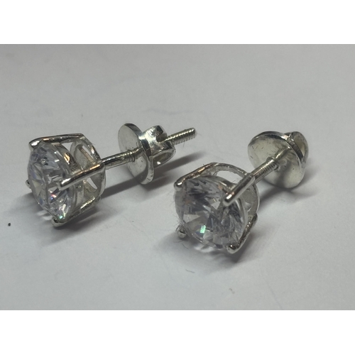 617 - A PAIR OF MARKED 925 STUD EARRINGS WITH CLEAR STONE SOLITAIRE AND SCREW ON BACK IN A PRESENTATION BO... 