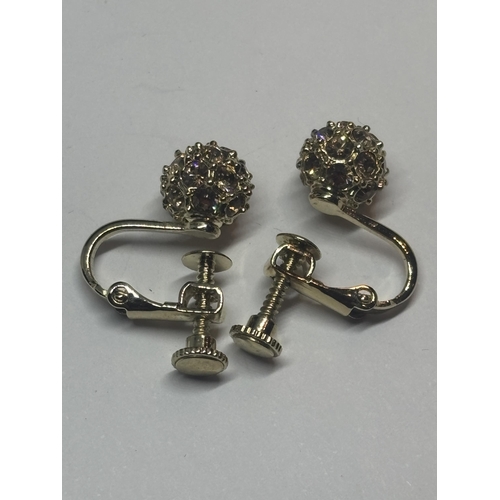 618 - A PAIR OF CRYSTAL BALL SCREW BACK EARRINGS IN A PRESENTATION BOX