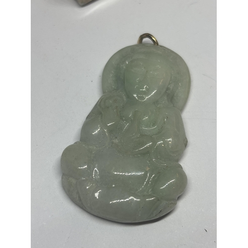 622 - AN ORIENTAL JADEITE PENDANT IN A PRESENTATION BOX