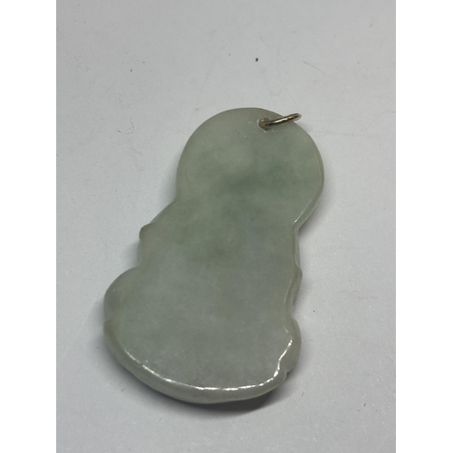 622 - AN ORIENTAL JADEITE PENDANT IN A PRESENTATION BOX