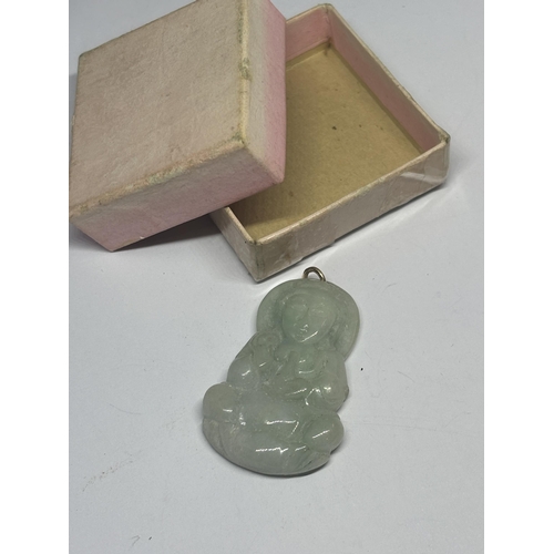 622 - AN ORIENTAL JADEITE PENDANT IN A PRESENTATION BOX