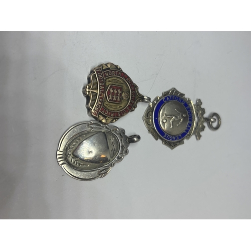 635 - FIVE HALLMARKED SILVER AND GOLD FOOTBALL FOBS