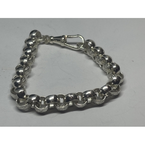 636 - A MARKED SILVER ROLLER BALL BRACELET