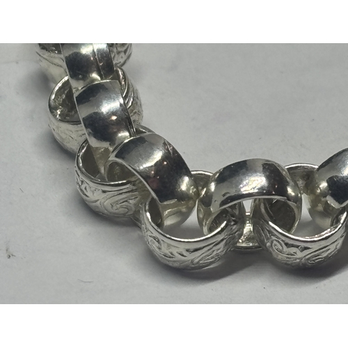 636 - A MARKED SILVER ROLLER BALL BRACELET