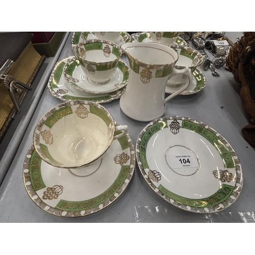 104 - VARIOUS ITEMS OF ST MICHAEL TEAWARE TO INCLUDE TRIOS, CAKE PLATE, SUGAR BOWL, JUG, CUPS AND SAUCERS