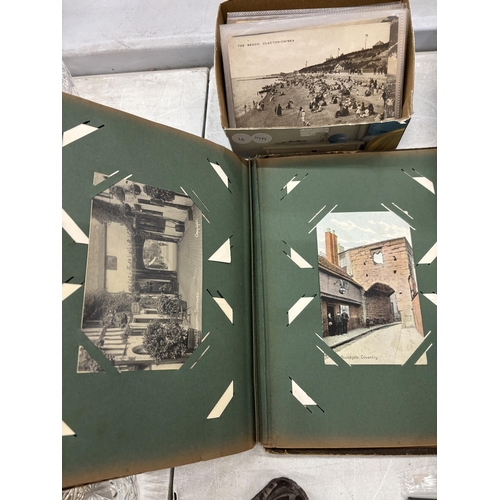 121 - A QUANTITY OF VINTAGE POSTCARDS TOGETHER WITH AN ALBUM CONTAINING POSTCARDS OF PLACES