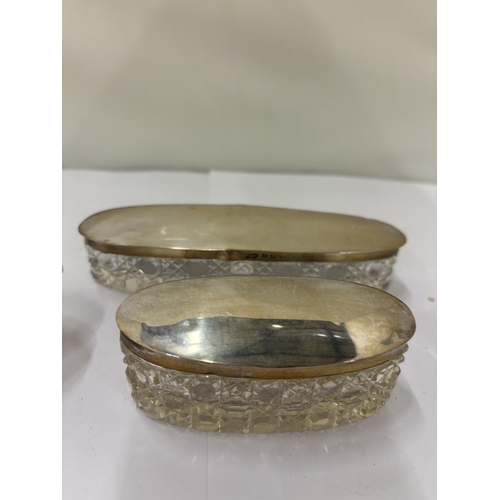 16 - FOUR GLASS DRESSING TABLE ITEMS WITH HALLMARKED SILVER MOUNTS TO INCLUDE TWO GLASS RECTANGULAR POTS,... 