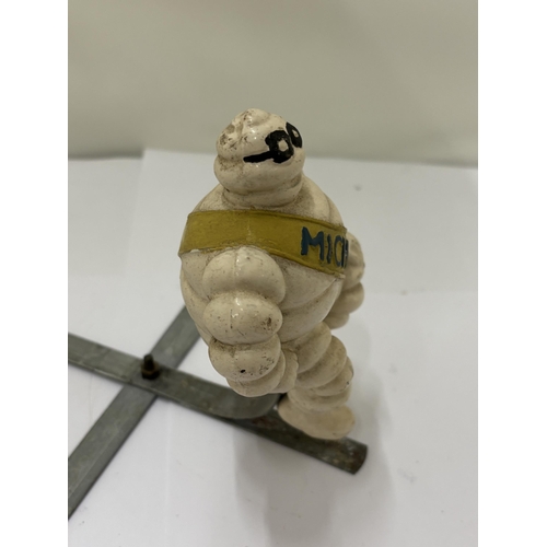 9 - A VINTAGE MICHELIN MAN POSSIBLE CAR/RADIATOR MASCOT, HEIGHT ON METAL STAND, HEIGHT 15CM