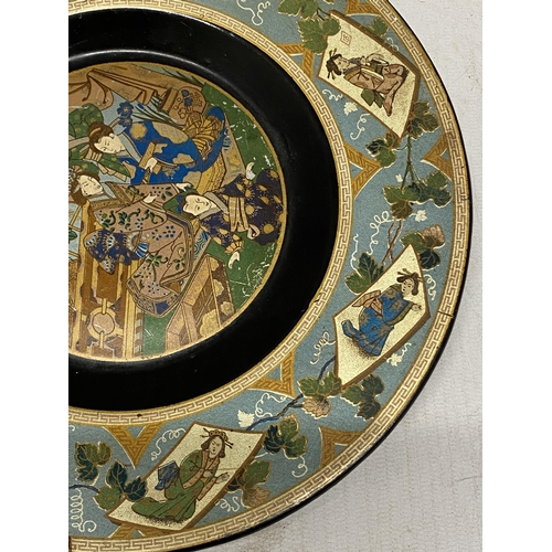 328 - A LACQUERED PAPIER MACHE FOOTED PLATE WITH VINE LEAF SHAPED HANDLES IN THE JAPANESE AESTHETIC STYLE ... 