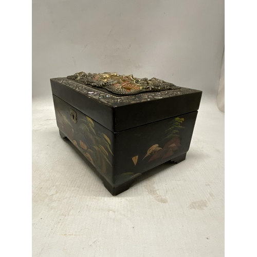 331 - A VINTAGE LACQUERED ORIENTAL HAND PAINTED JEWELLERY BOX WITH RAISED RELIEF DETAIL AND INLAID MOTHER ... 