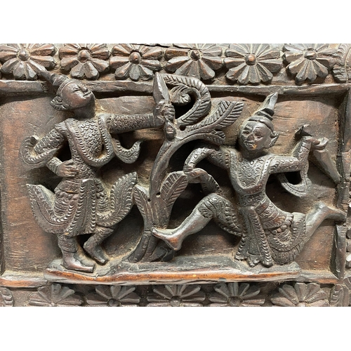 339 - A HAND CARVED WOOD RELIEF BALINESE WOOD ART WALL HANGING