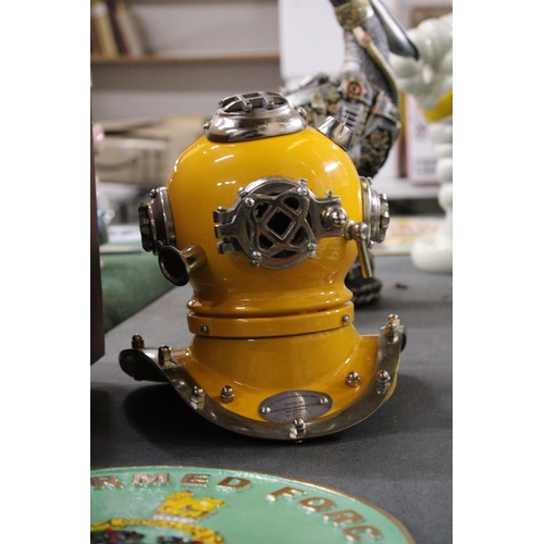 194 - A CHROME AND YELLOW REPLICA OF A DIVER'S HELMET, HEIGHT APPROX 19CM