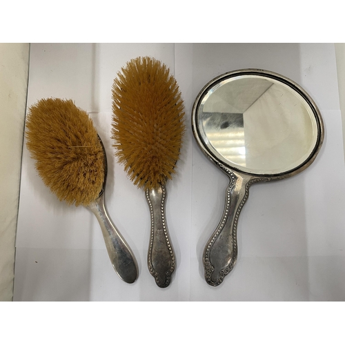 27 - THREE HALLMARKED SILVER DRESSING TABLE ITEMS, TWO CHESTER AND ONE BIRMINGHAM TO INCLUDE TWO BRUSHES ... 