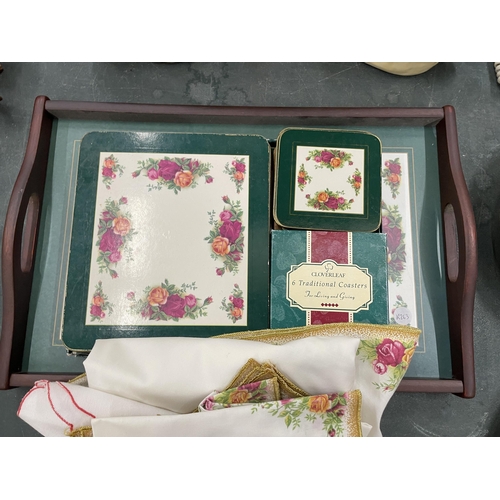 79 - AQUANTITY OF ROYAL ALBERT 'OLD COUNTY ROSES' PLACEMATS, COASTERS, A TABLECLOTH, NAPKINS, TRAY, ETC