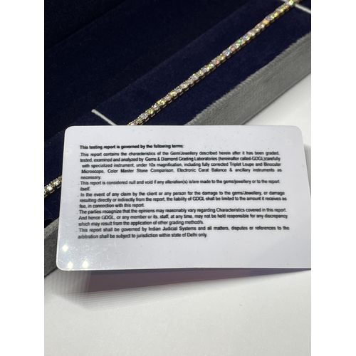 511 - A MARKED 14K ROSE TENNIS BRACELET WITH A GEMOLOGY CARD IN A PRESENTATION BOX