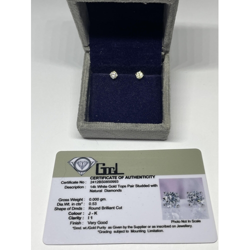 638 - A PAIR OF MARKED 14K SOLITAIRE EARRINGS WITH SCREW ON BUTTERFLY IN A PRESENTATION BOX WITH GEMOLOGY ... 