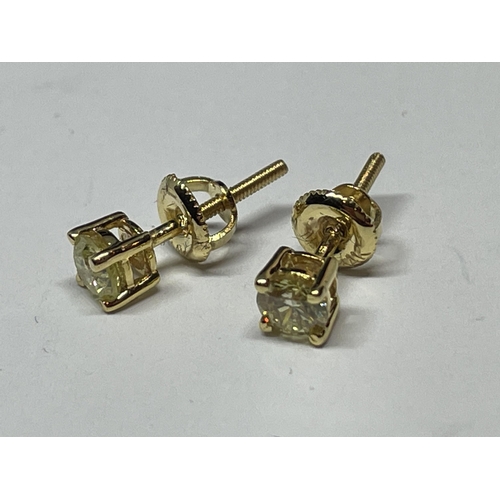 646 - A PAIR OF MARKED 14K SOLITAIRE EARRINGS WITH SCREW ON BUTTERFLY IN A PRESENTATION BOX WITH GEMOLOGY ... 