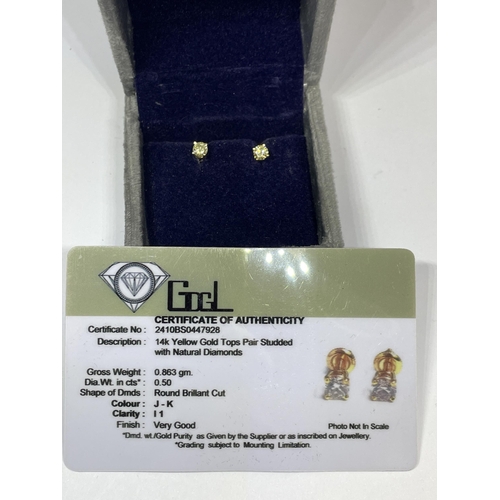 646 - A PAIR OF MARKED 14K SOLITAIRE EARRINGS WITH SCREW ON BUTTERFLY IN A PRESENTATION BOX WITH GEMOLOGY ... 