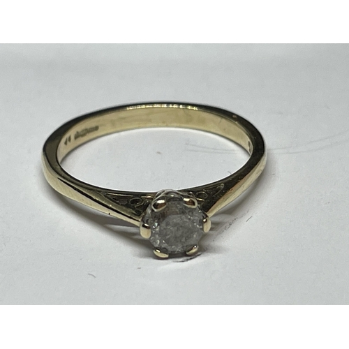 647 - A MARKED 9 CARAT GOLD RING WITH DIAMOND SOLITAIRE SIZE N IN A PRESENTATION BOX