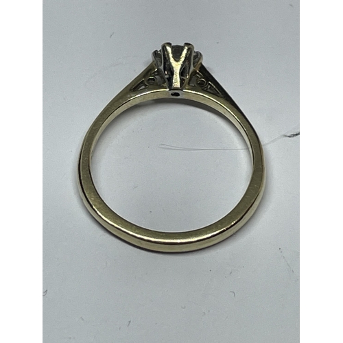 647 - A MARKED 9 CARAT GOLD RING WITH DIAMOND SOLITAIRE SIZE N IN A PRESENTATION BOX