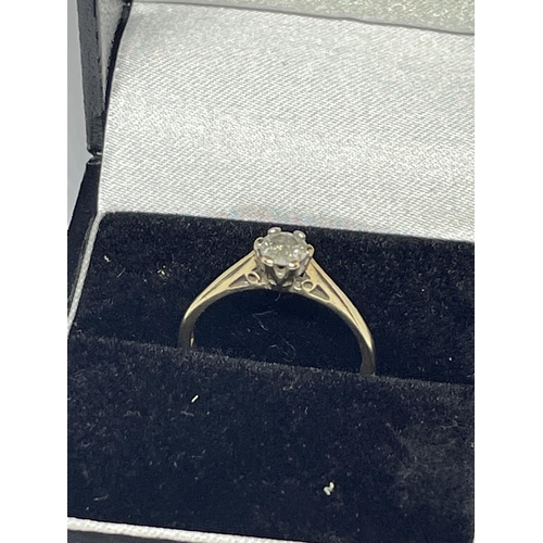 647 - A MARKED 9 CARAT GOLD RING WITH DIAMOND SOLITAIRE SIZE N IN A PRESENTATION BOX