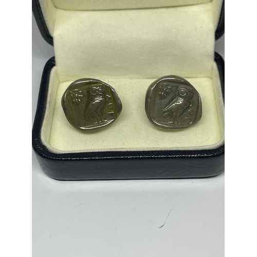 650 - A PAIR OF OWL OF ATHENA CUFFLINKS IN A PRESENTATION BOX