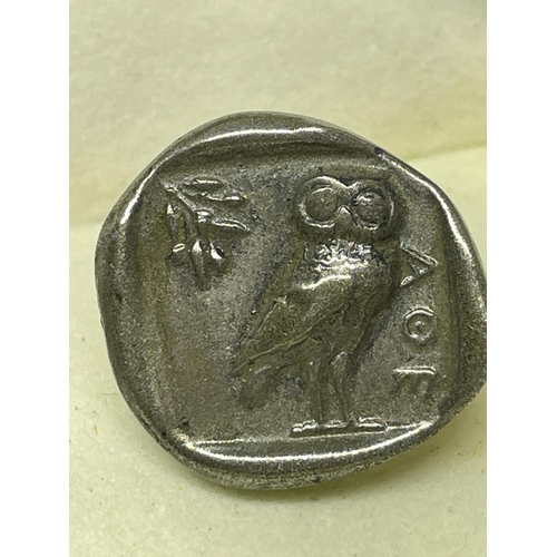 650 - A PAIR OF OWL OF ATHENA CUFFLINKS IN A PRESENTATION BOX