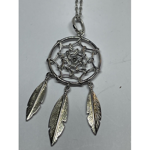 659 - A MARKED SILVER DREAM CATCHER PENDANT ONA MARKED SILVER NECKLACE