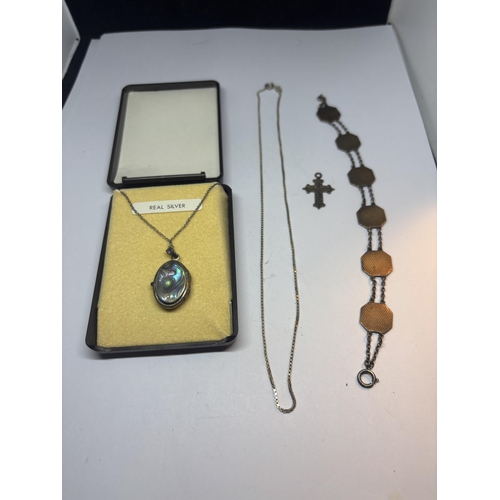 671 - FOUR MARKED SILVER ITEMS TO INCLUDE A NECKLACE WITH PAUA SHELL LOCKET, A BOX LINK NECKLACE, CROSS PE... 